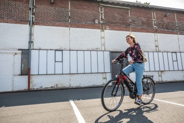 De ontwikkeling in de infrastructuur voor elektrische fietsen